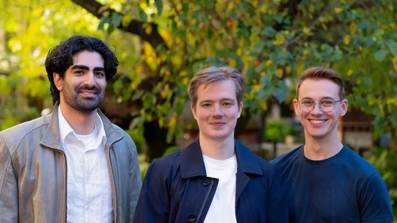 Three Strawberry founders smiling in an autumn garden